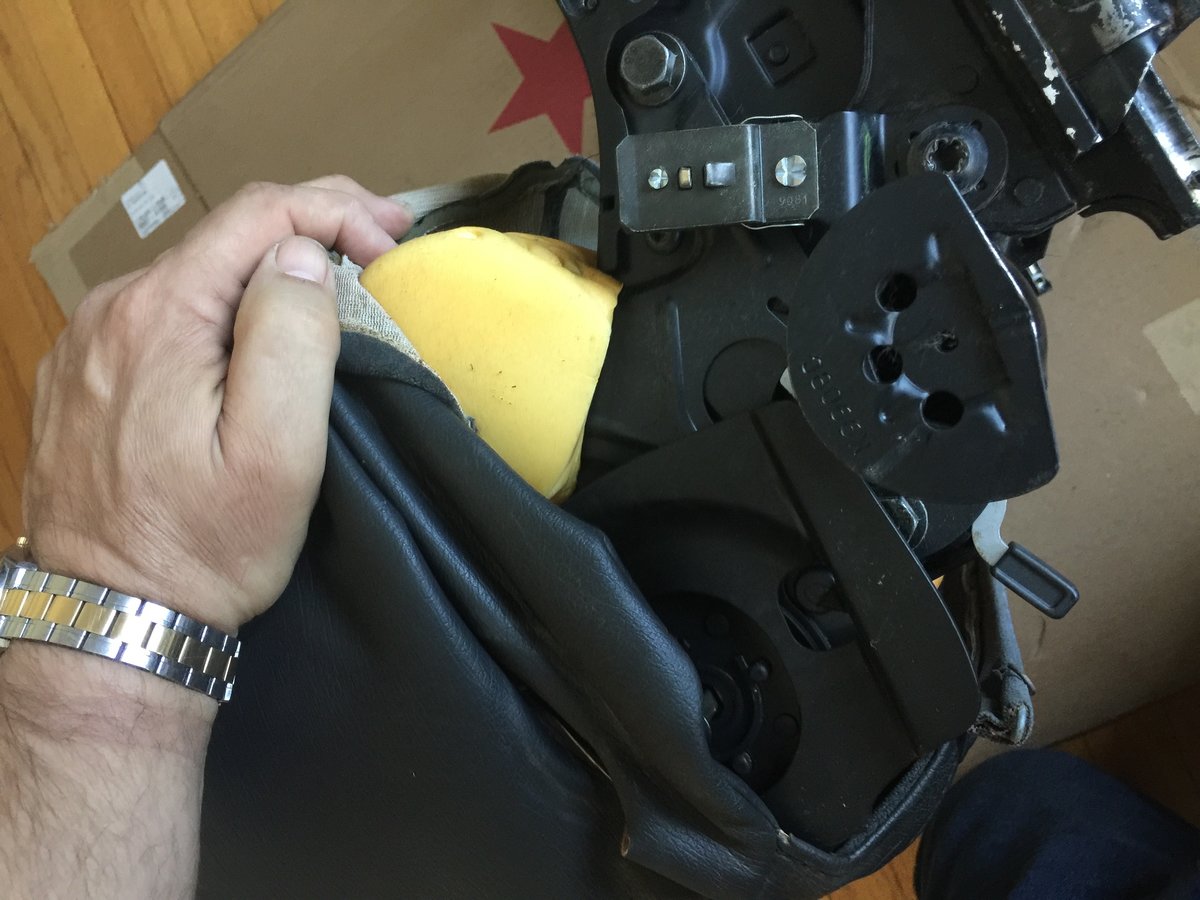 There is a release at the bottom of the back seat cover you have to fuss with