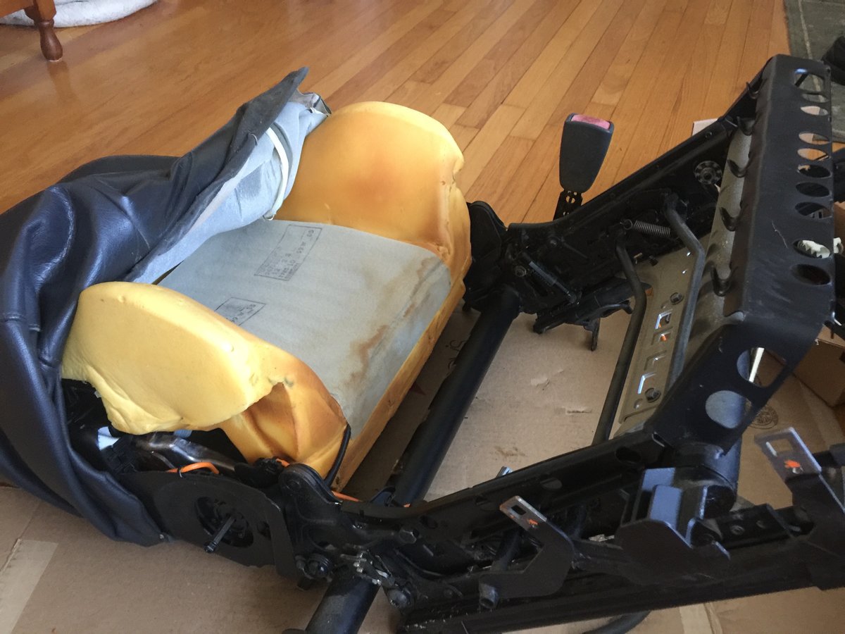 Work it up, undoing hog rings as you go