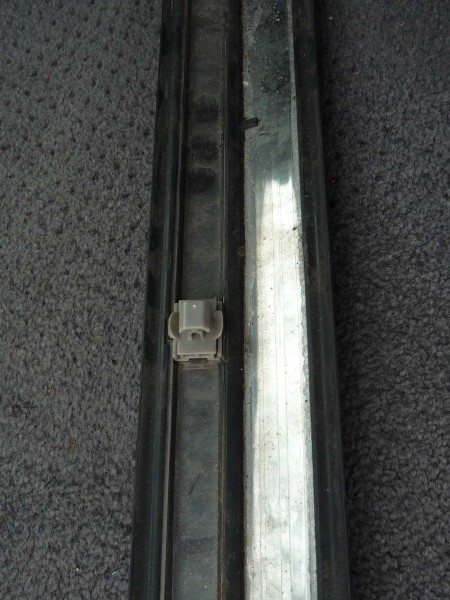 Reverse side of trim showing clip