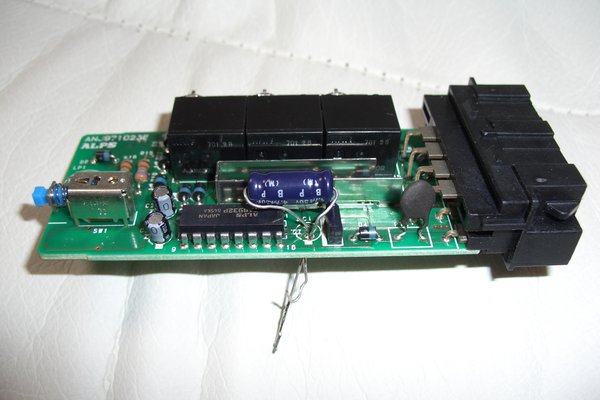 New capacitor prior to reinstallation.  Don't forget to cut of the leads :)