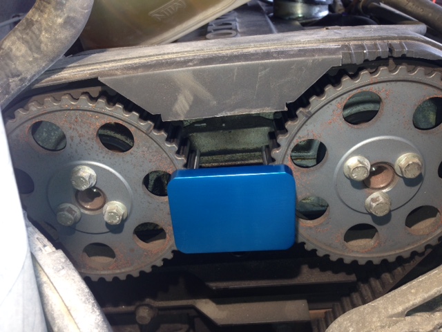 cam pulleys aligned with notches