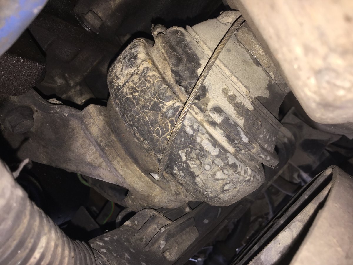 Front engine mount (just behind radiator)