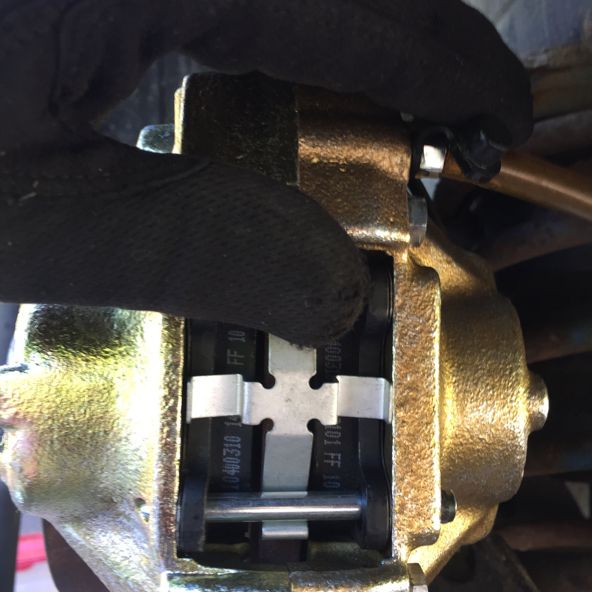 Bottom pin goes in with fingers