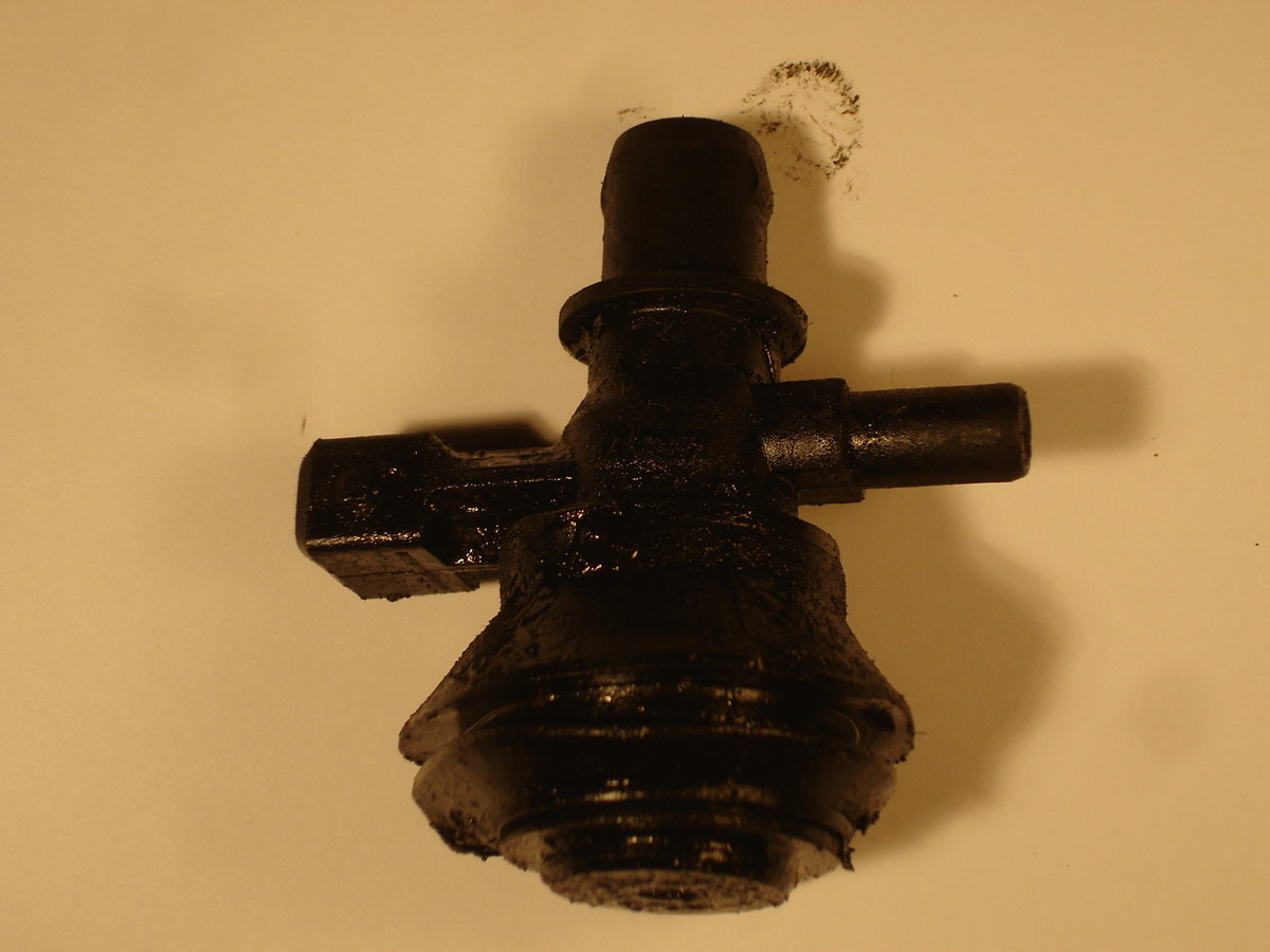 Surprised at how much oil is all over the PCT valve and everything around the point where it connects to the air intake.