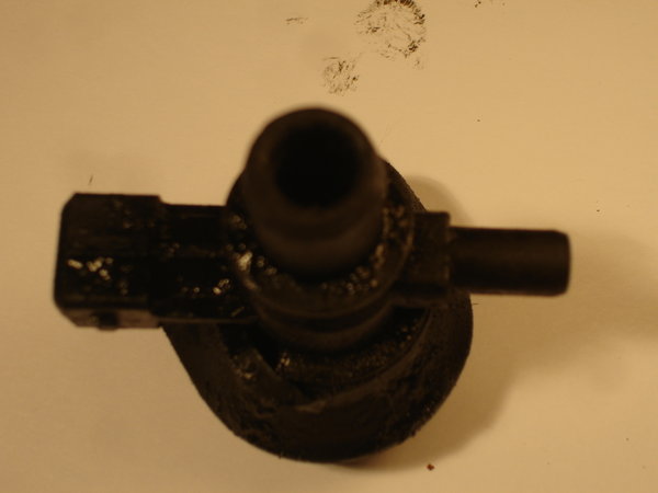 The PCT right after removal. The large tube at top has significant deposits.