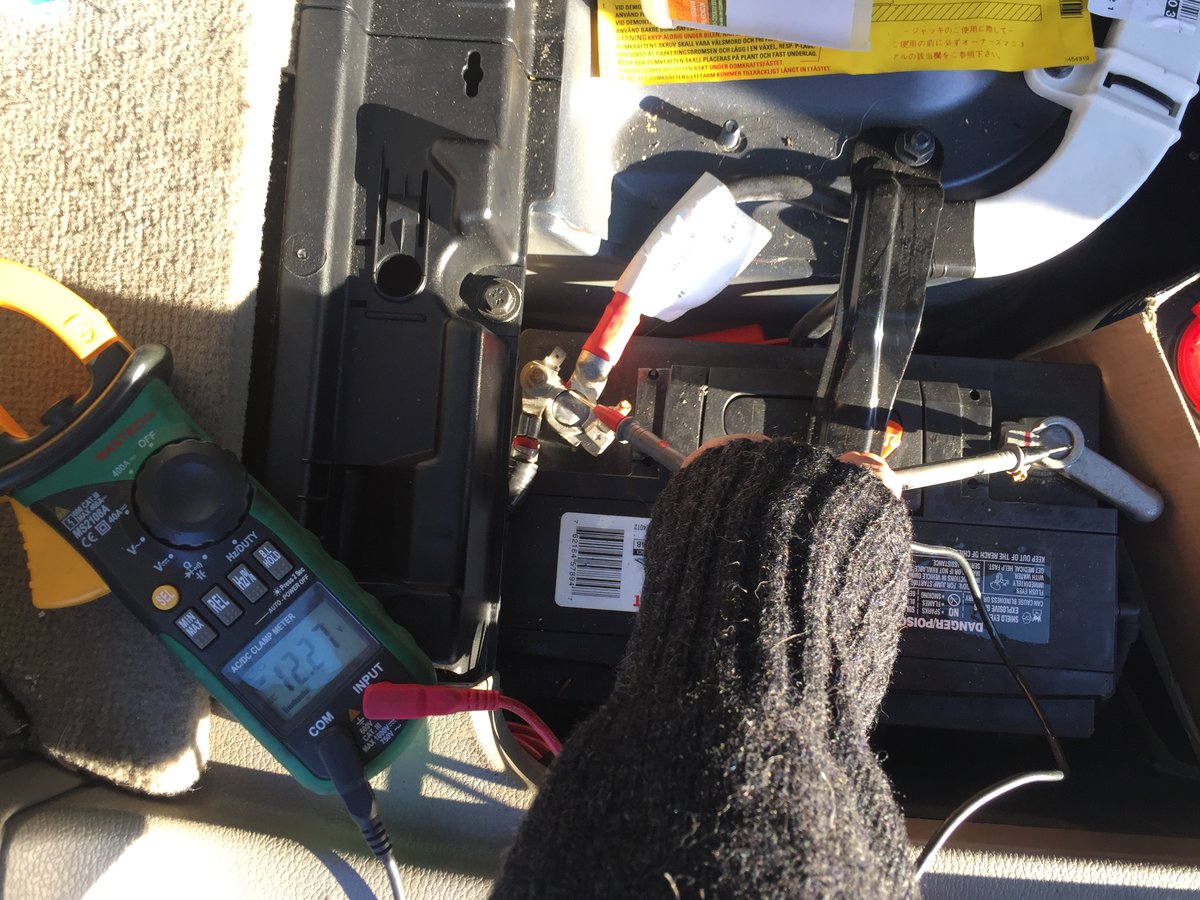 Battery voltage with leads pressed firmly into terminals