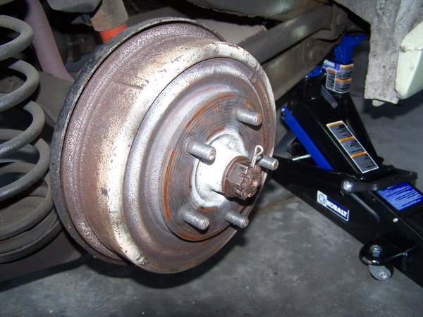 After pulling off the whell, this is what you get. I assume you need to pull the pin and remove the big nut. HINT- block the wheels and remove the parking brake. The hub comes off easier that way!