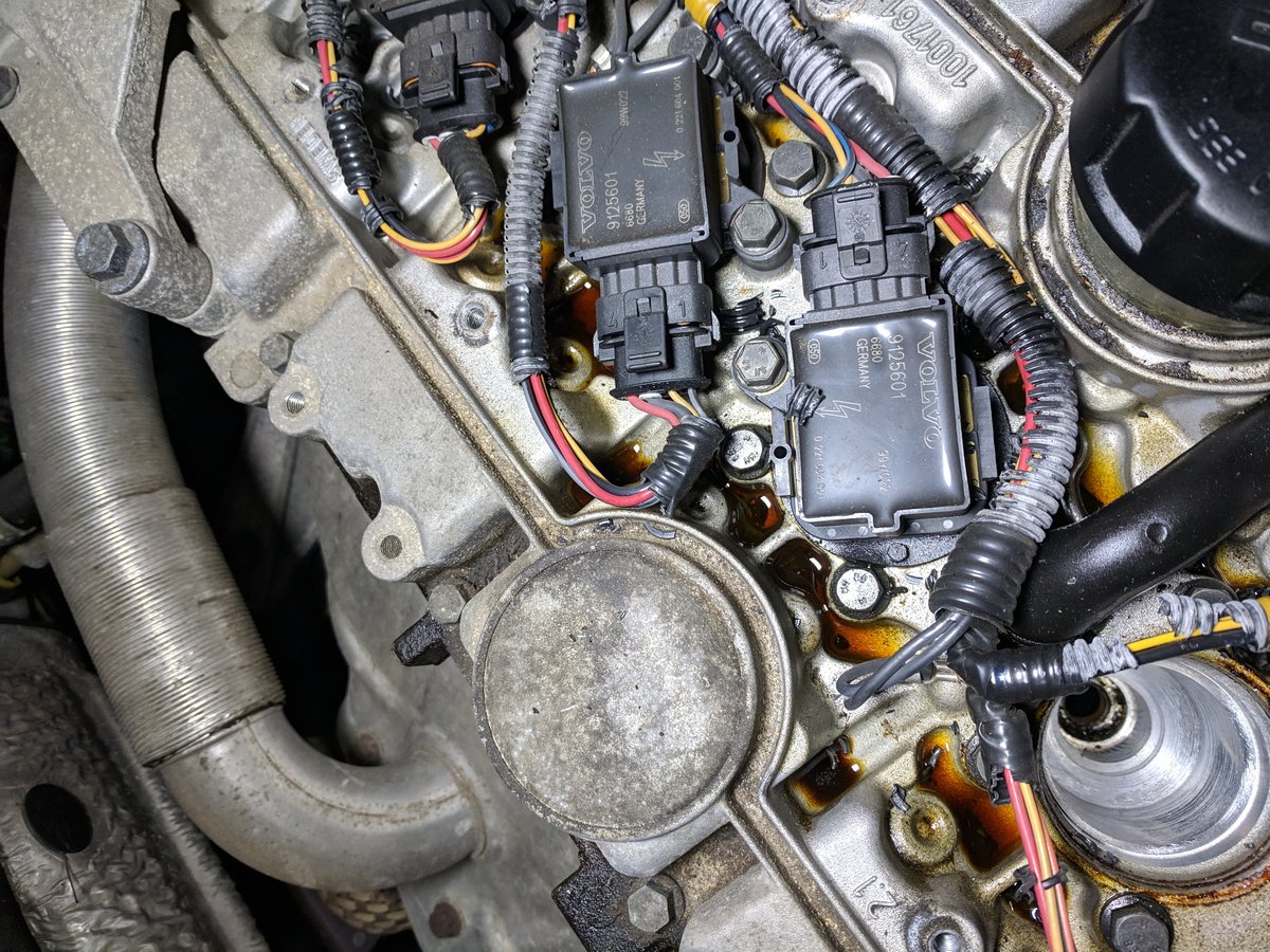 Oil leak on top of engine.jpg