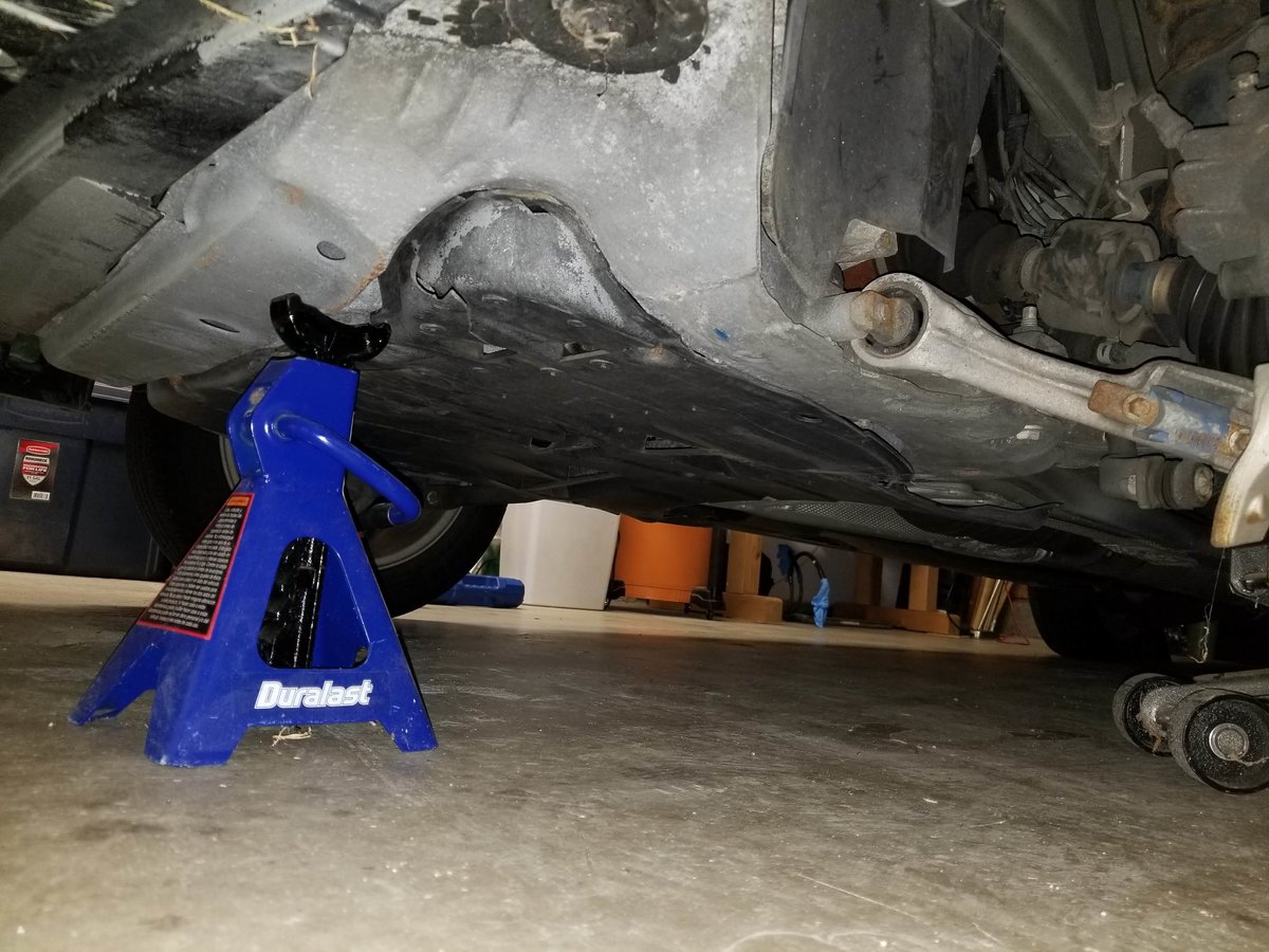 subframe dent from front driver side quarter.jpg