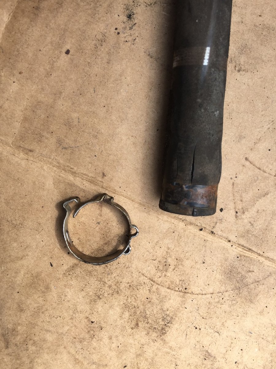 Strange clamp on the EVAP hose - classic split in hose causing either P0455 or no EVAP MON READINESS