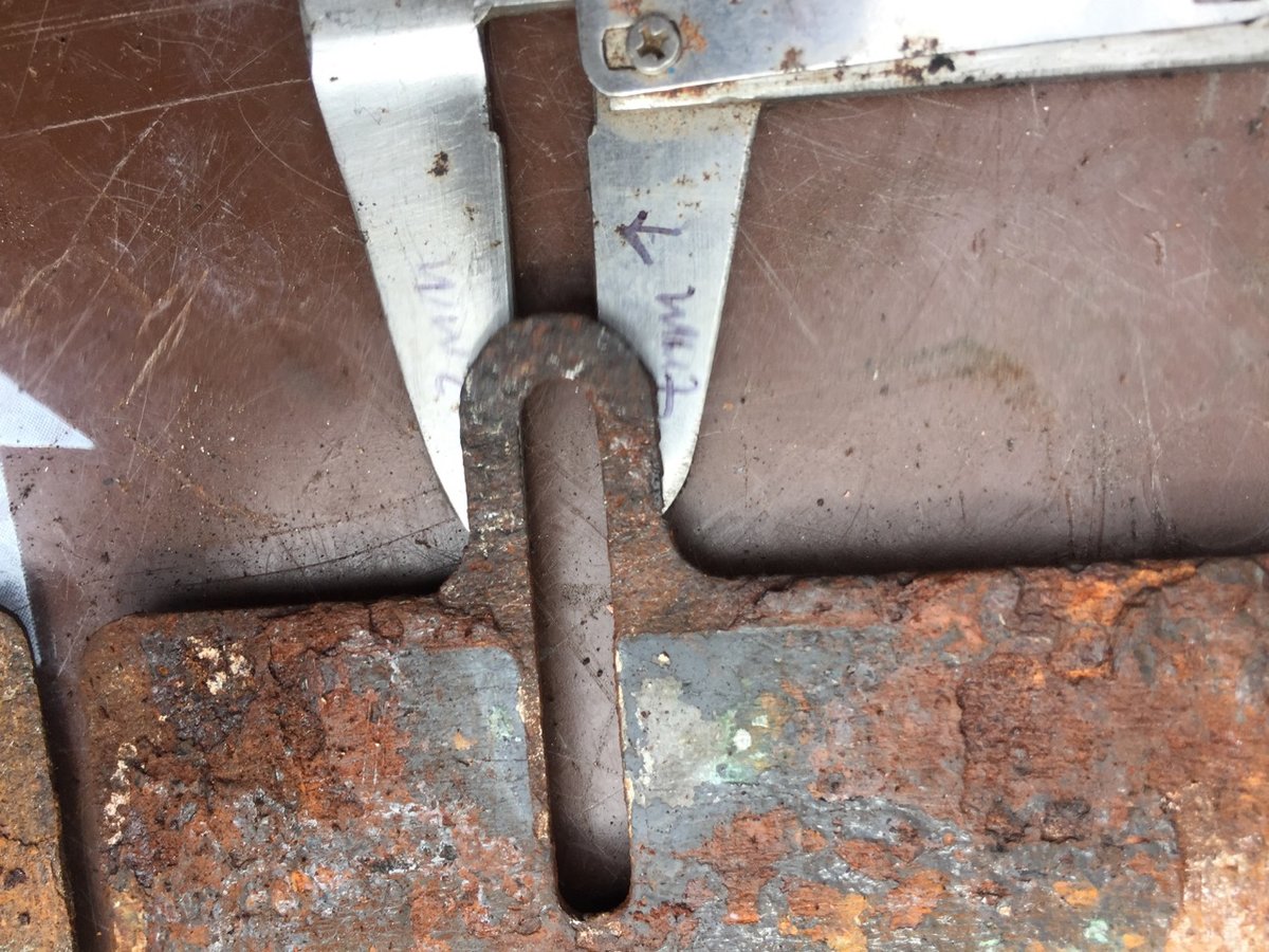 Once drilled out, a M6 SS will nicely replace that clearance the slot and the EVAP bracket