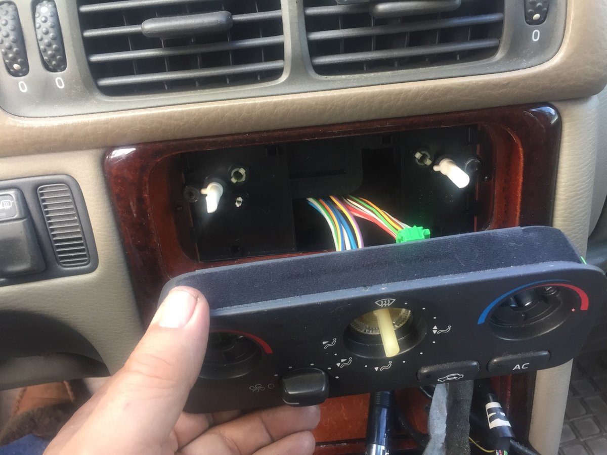 Rear side of MCC controller pulls forward, release with spudger on sides and top/bottom