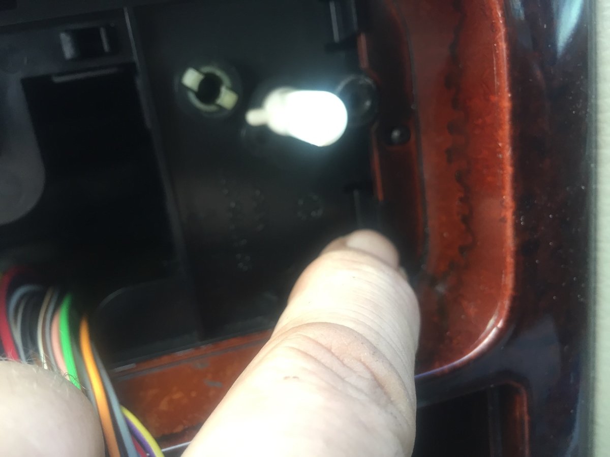 Unclip two clips on each side of MCC controller, then push it forward