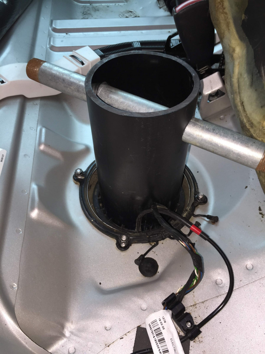 Retaining ring tool in place on drivers side access port.