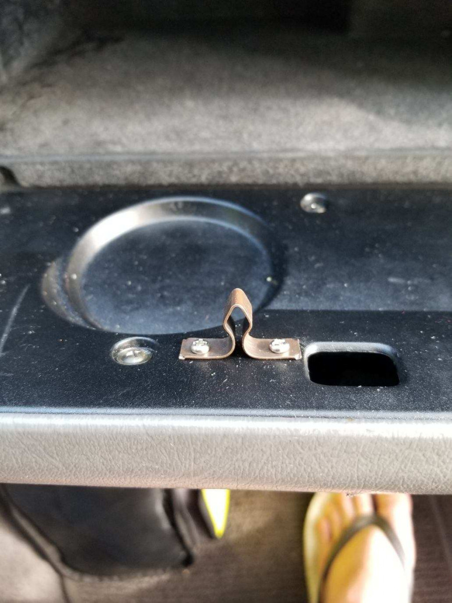 Spear mounted on Glove Box Door.