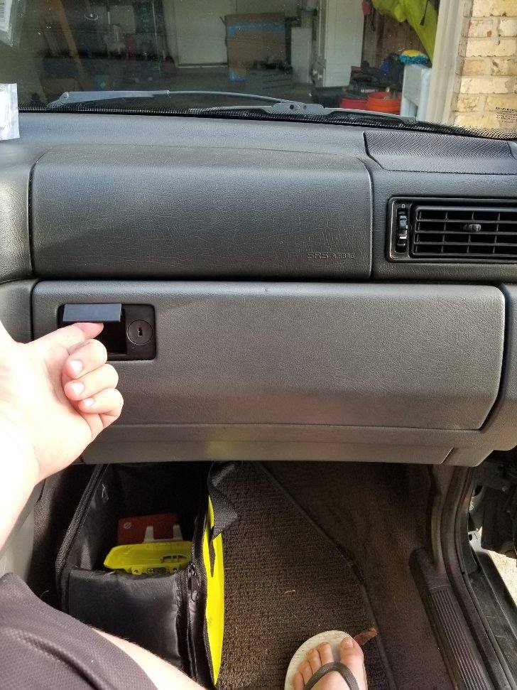 Use the original handle to pull the door open.