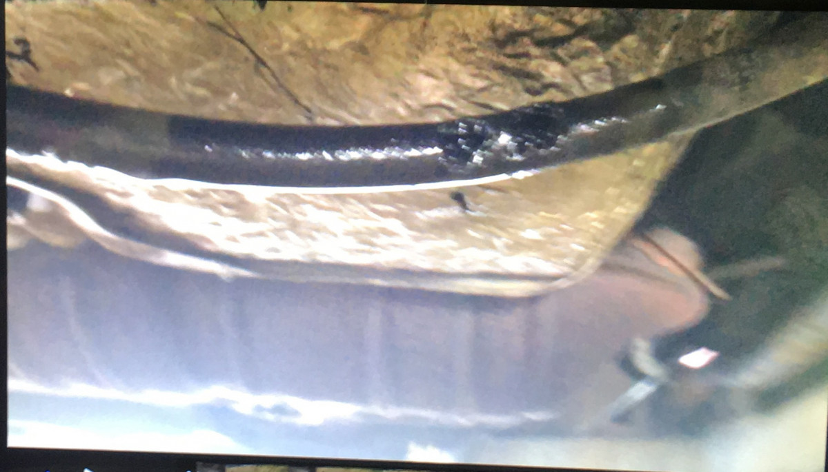 The leak was easy to find, just look above the puddle:)