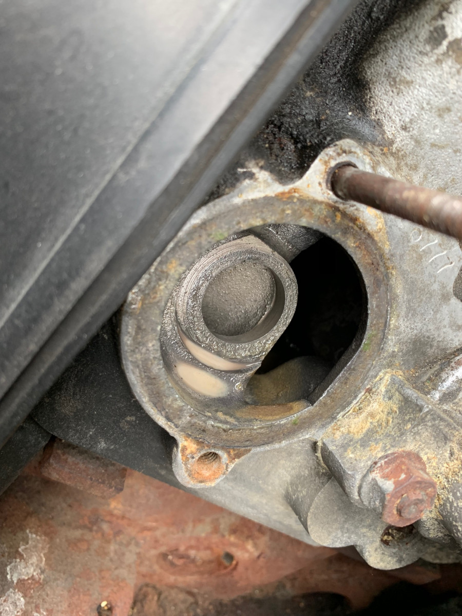 Under thermostat housing