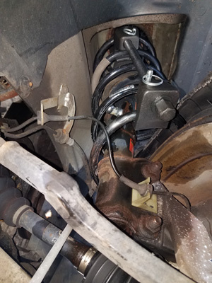 rear spring compressor from below