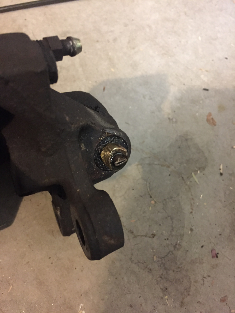 Old caliper with rounded brake line nut