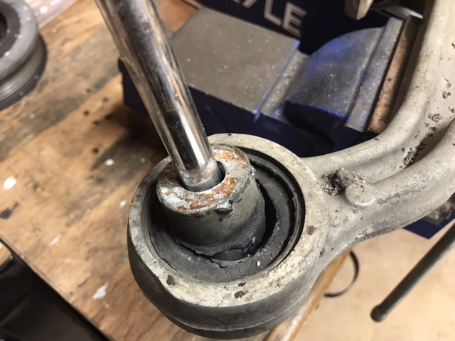 Shot rear control arm bushing