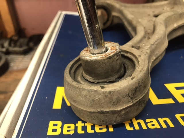 Shot rear control arm bushing