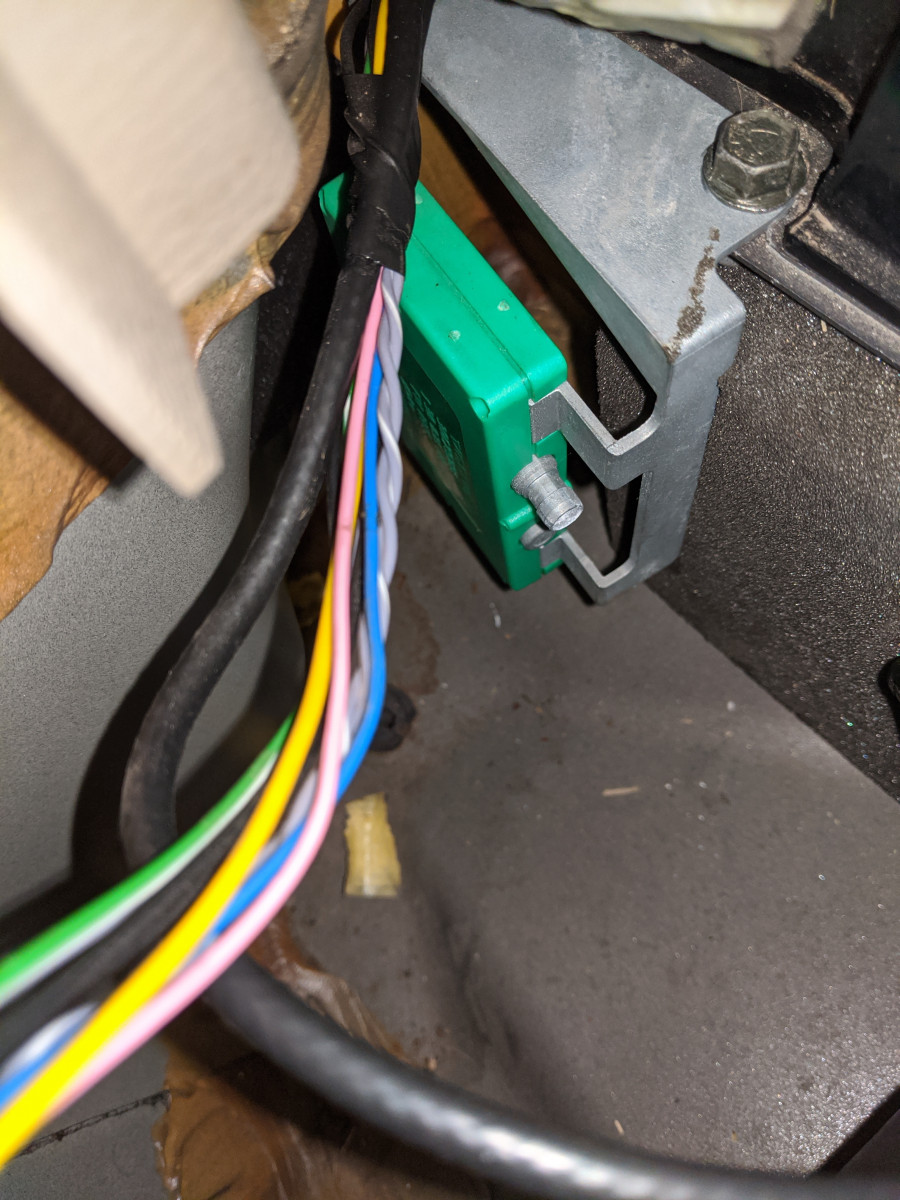 Green box in RH fender well.