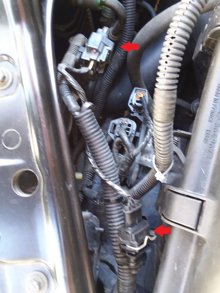 The wire wrapped around a loom and zip-tied in place