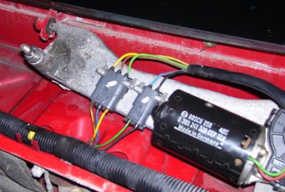 Wiper assembly showing electrical connectors, and pin/grommet mentioned in step 4.)