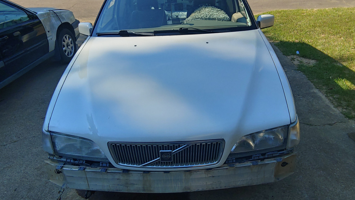 white hood, no bumper cover, lights and hood line up mostly