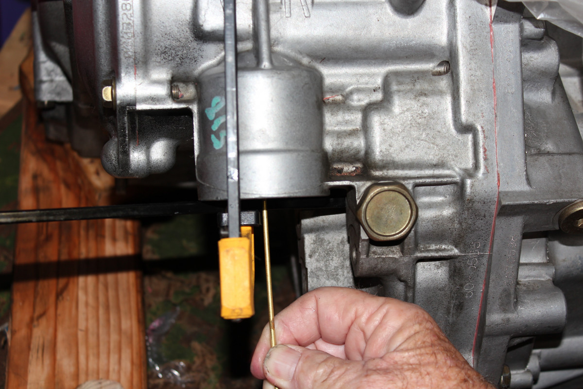 Using rod to compress band.JPG