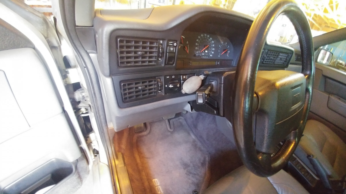 I folded it over and slipped it between the steering column and the dash.