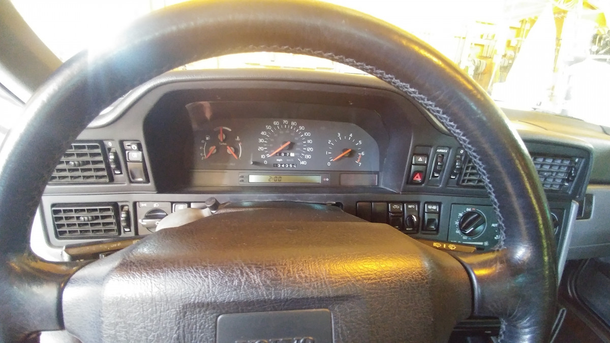 Not too visible while driving. The new ones are actually black so that would help.