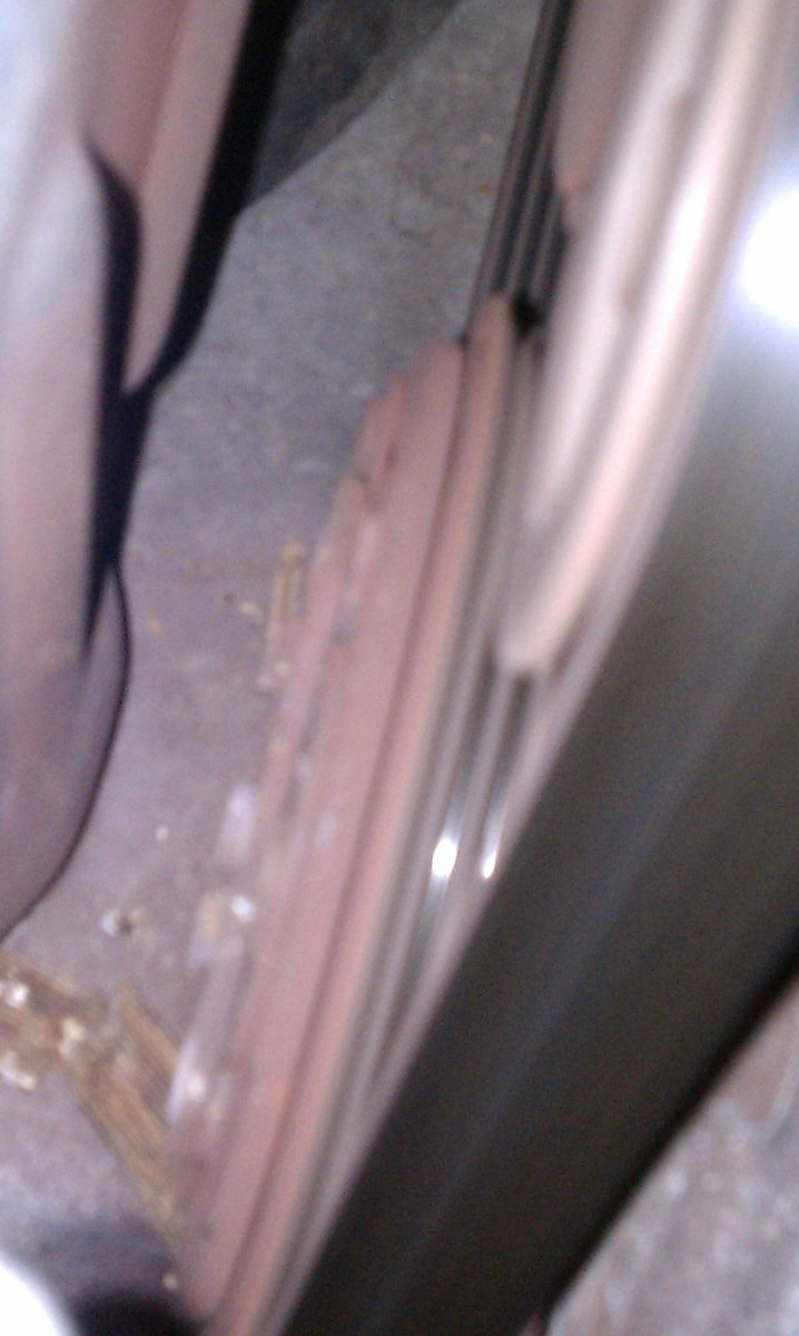 Is this the Compressor?  That thin disk on the outside is not spinning while the wheel/belt are.