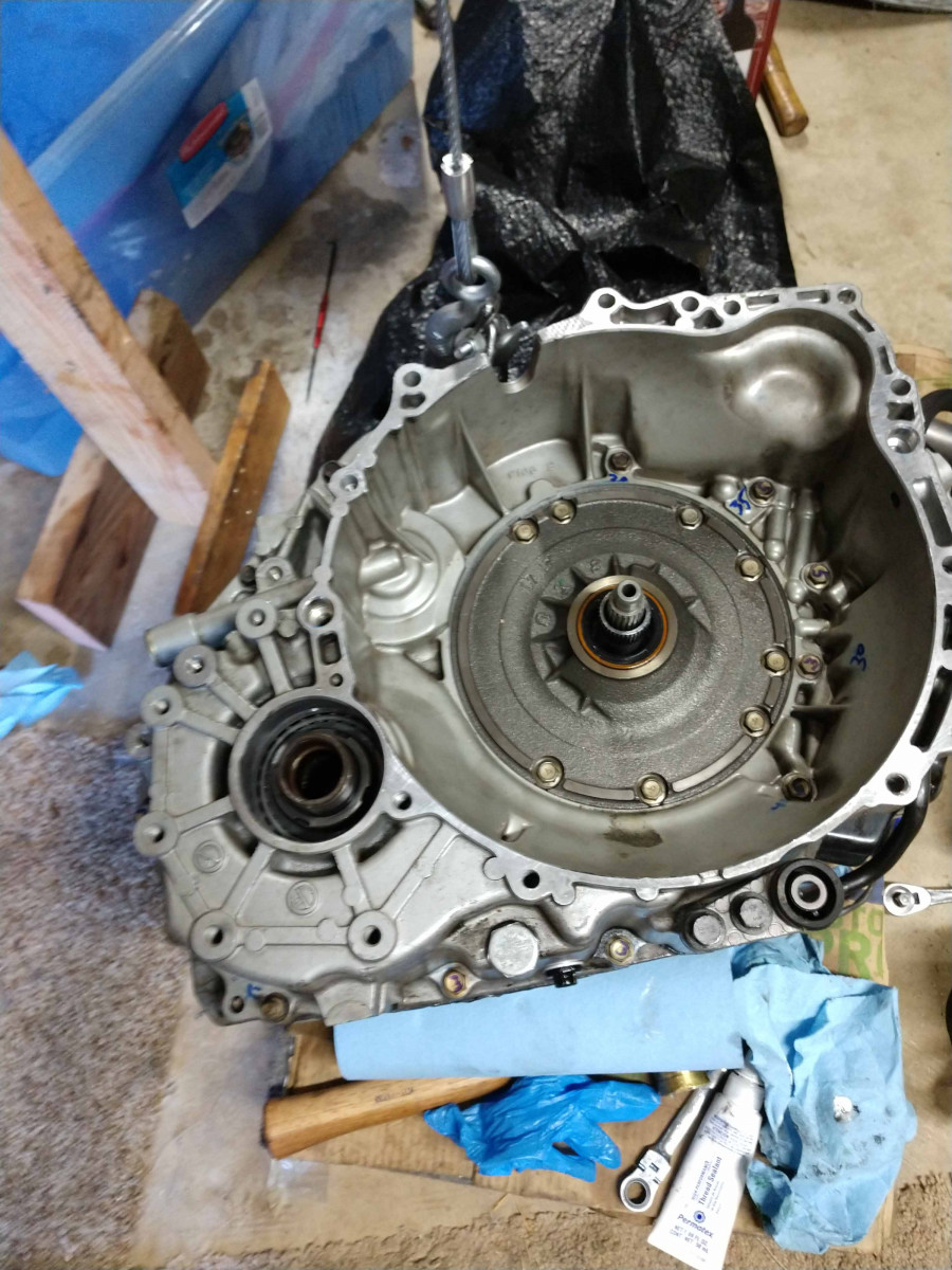 Trans positioned on side for case and pump bolt removal.jpg