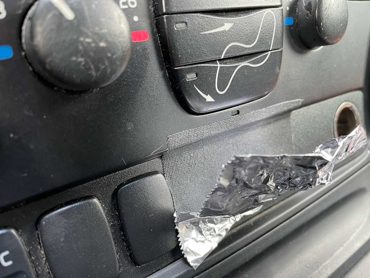 Here's my quick, cheap (and temporary) fix. The sensor itself is slightly receded and that might be the root of the problem but I wasn't able to push it back flush with the housing. Foil works but is not quite to Swedish standards.