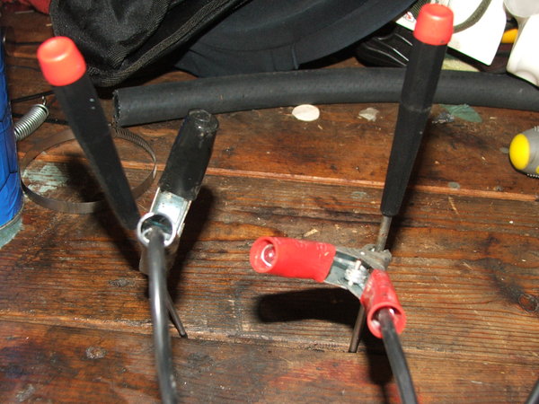 Ghetto solenoid excersiser. Two screwdrivers and a battery charger!