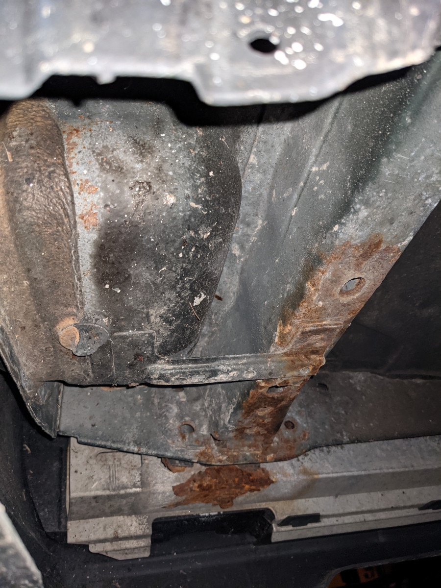 Rust from road salt spray due to no mudflap.