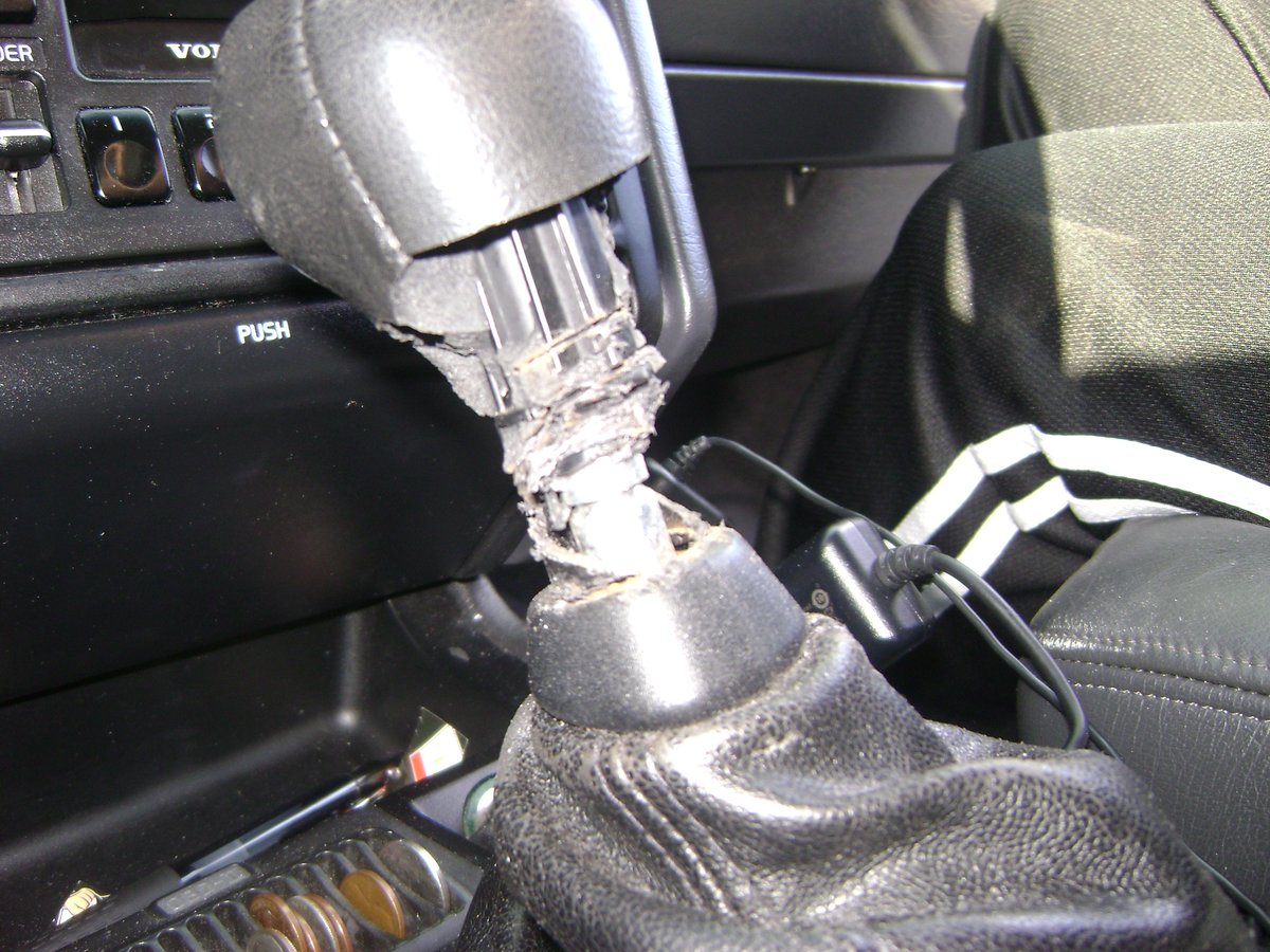 Gear shift knob cutaway to show locking groove.