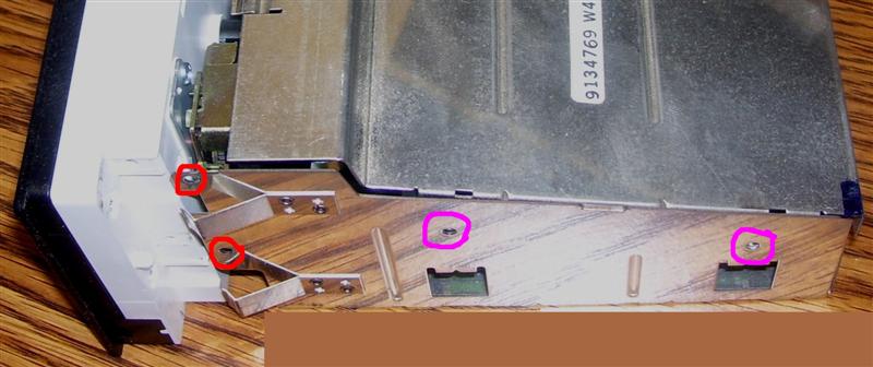 Screw locations to remove cover and front panel.