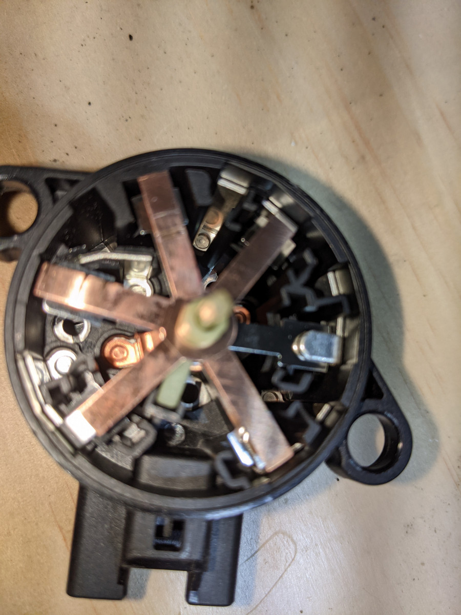 Electrical mechanical pins at inner base of switch