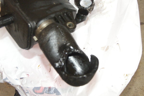 Notice enlarged hose and tearing.