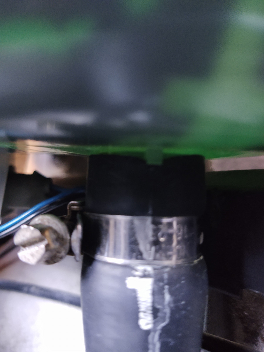 leak around the area between bottom of tank and hose end; then dripped down along the hose