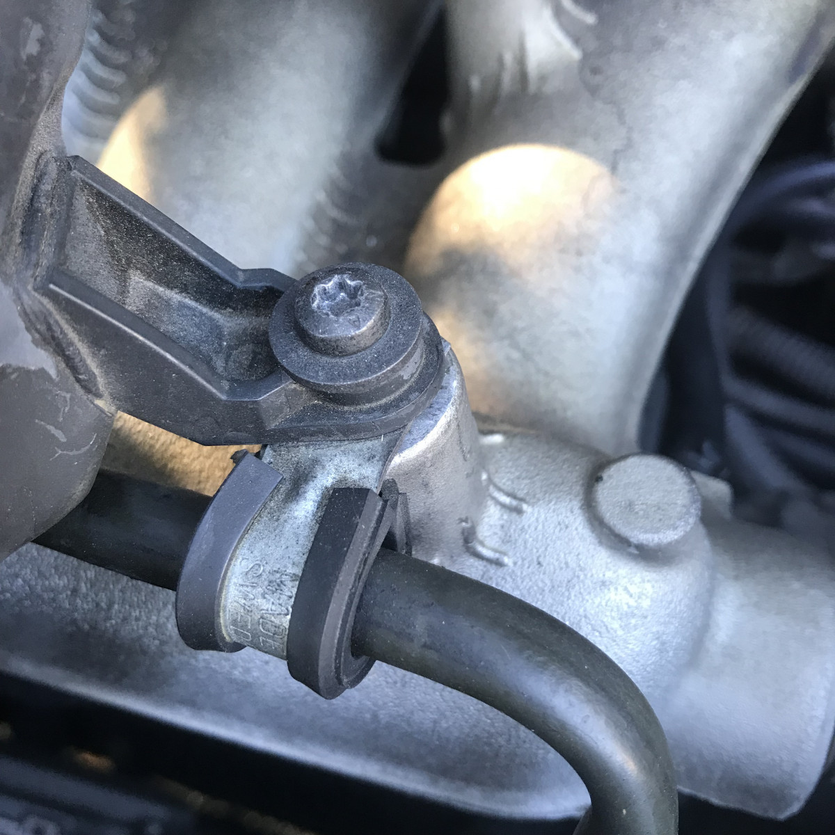 Closeup - Charge Air Pipe to Intake Manifold screws
