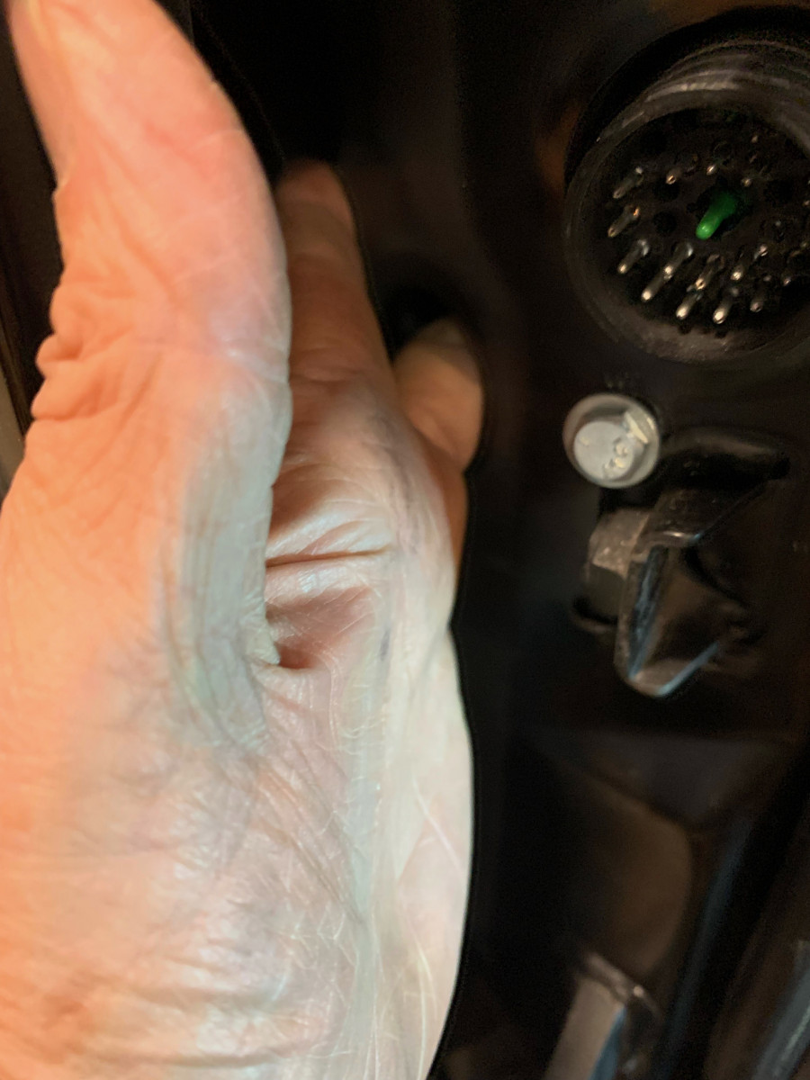 checking bolt end with finger