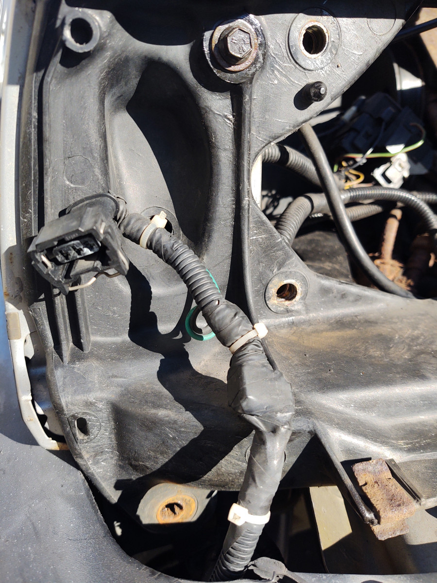 Lower bolt of the passenger side broken off due to rust