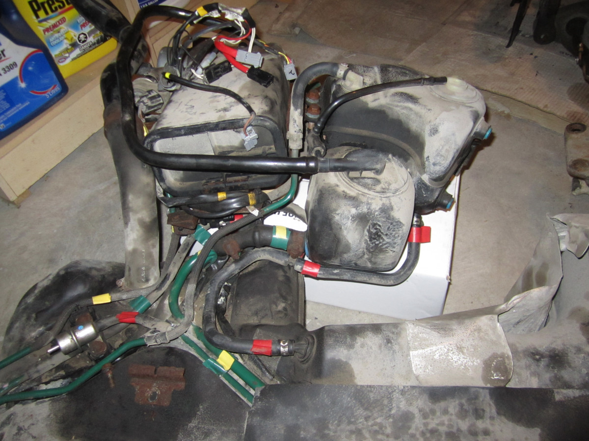 Emissions and fuel expansion tanks