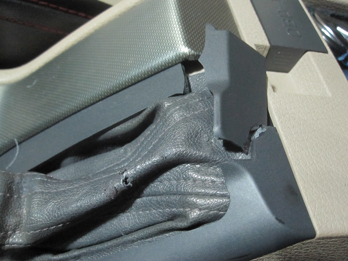 IMG_2006 - broken by caleb at rimguard, parking brake handle housing.JPG