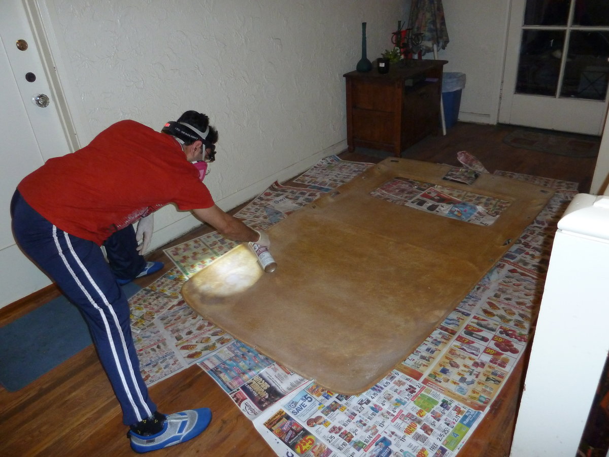 Spray on primer or glue.