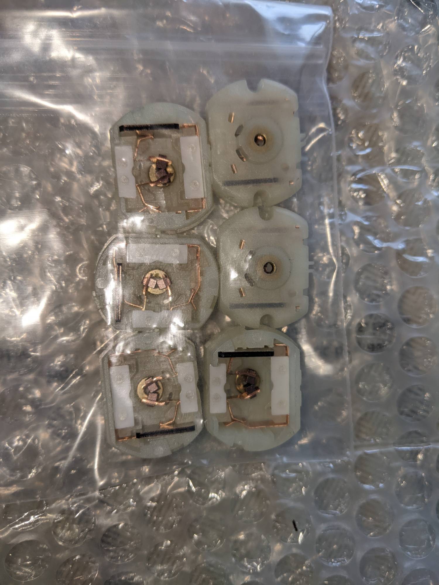 Actuator motor end caps and tiles